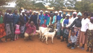Ladies with donated goats pic 1 COM