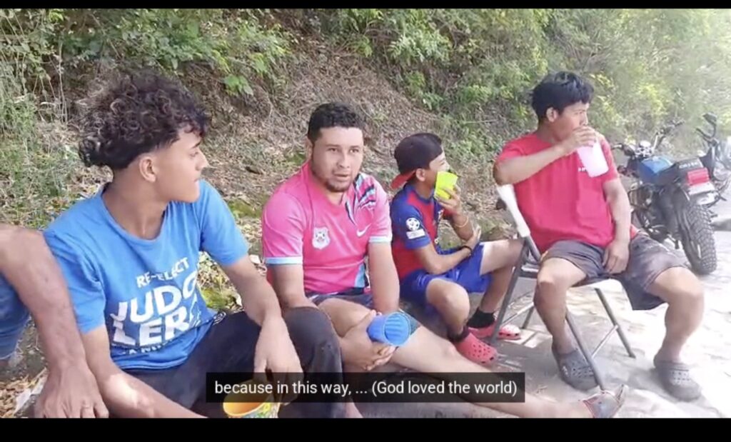 Kevin sharing gospel on the street with kids