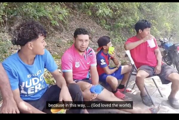 Kevin sharing gospel on the street with kids