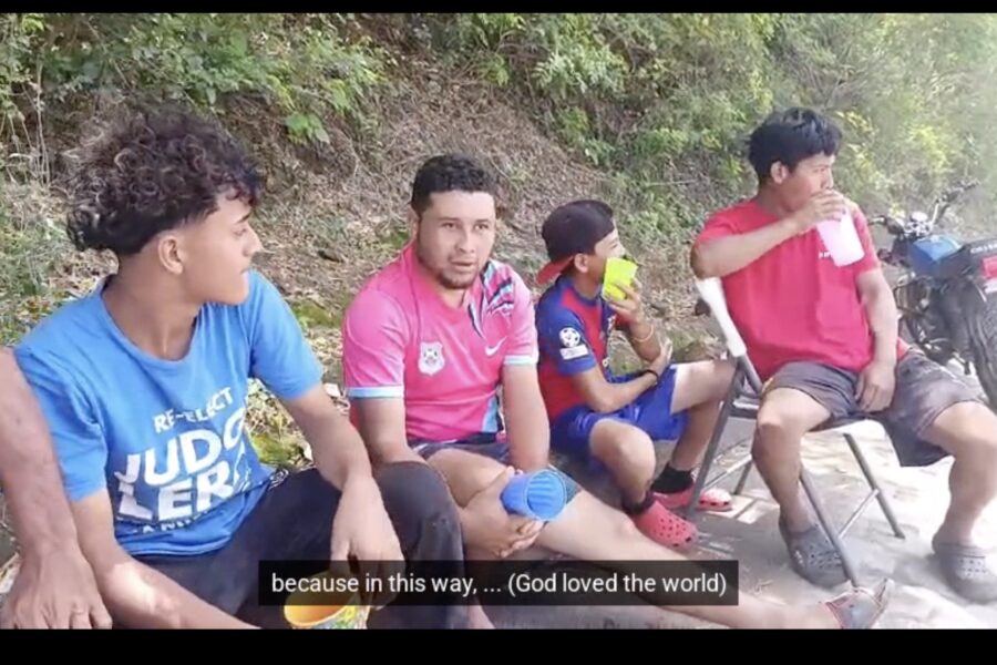 Kevin sharing gospel on the street with kids